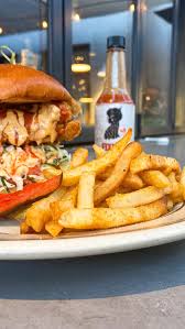 Fixins Soul Kitchen signature dishes Chicken SandwichFried FishSmothered Chicken